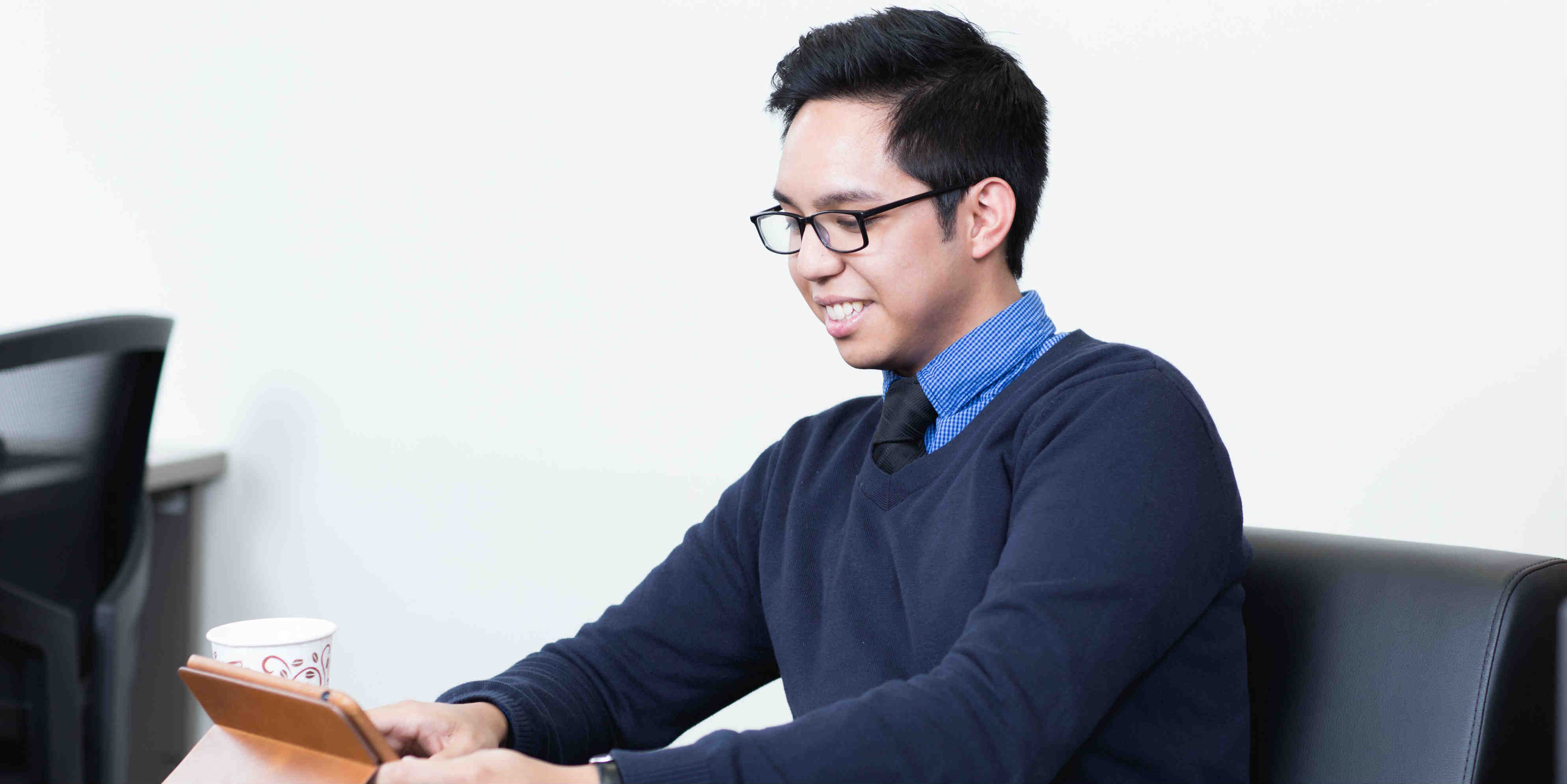 A North Central student checks his account.